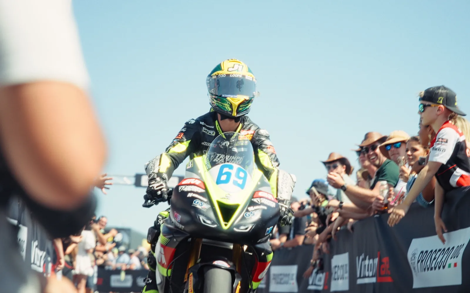 Rider greeting fans after a race