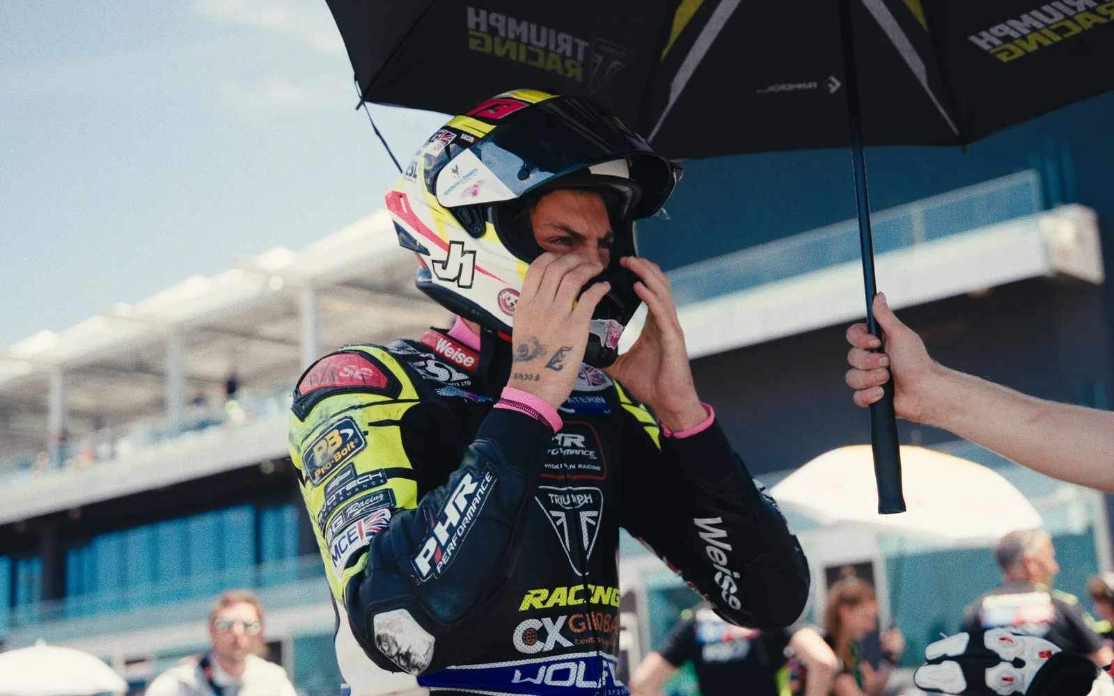 A rider preparing trackside, captured by Ben
