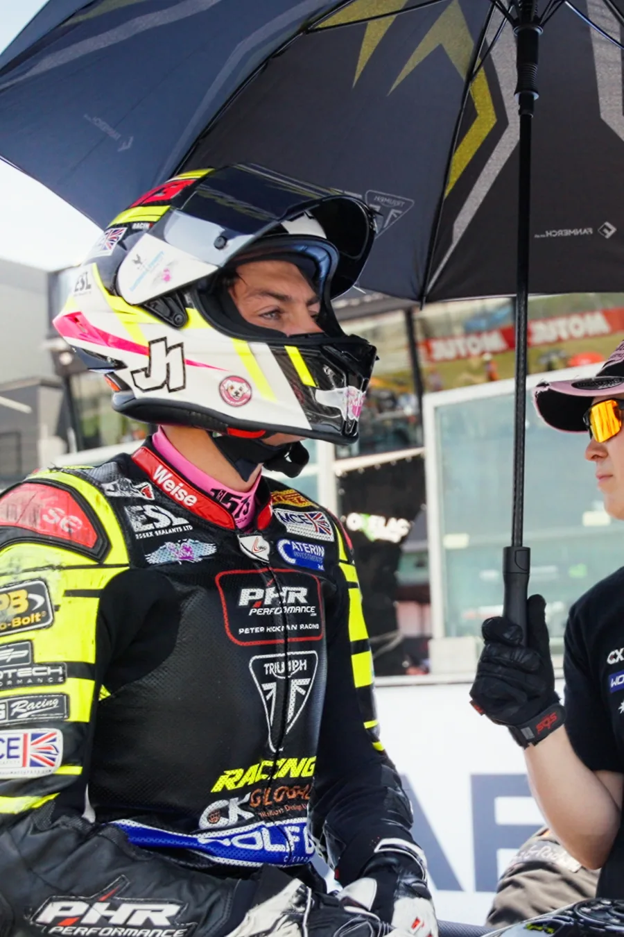 Rider and team captured in the paddock